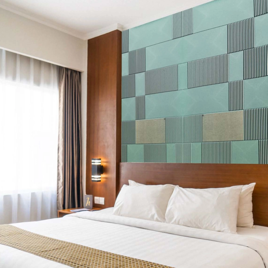 Barcode patterned green fluted MDF & HDF panel in a modern bedroom interior