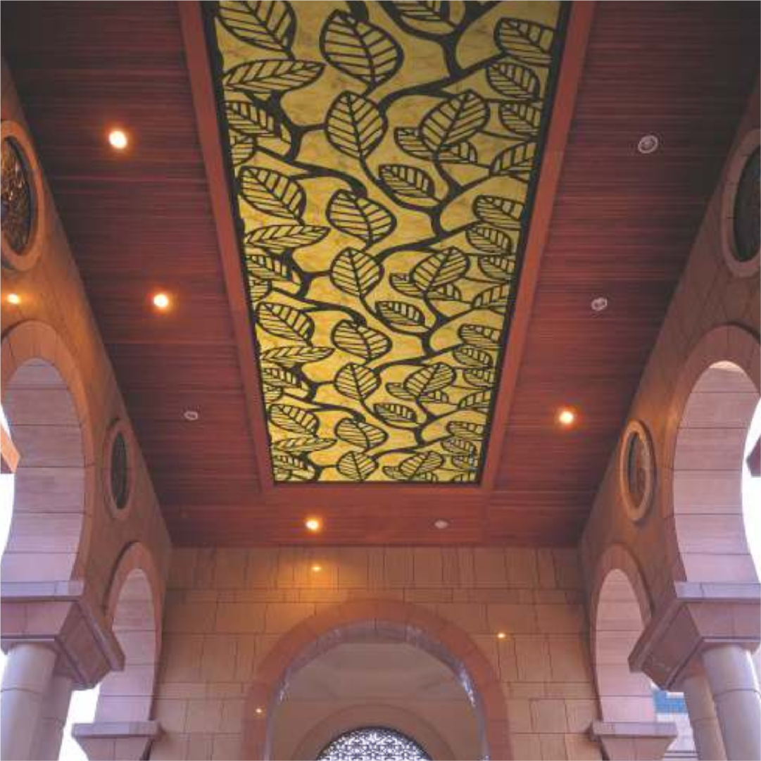 Golden yellow-colored 3D backlit ceiling panel featuring an intricate leaf design, ideal for luxurious outdoor and indoor spaces.