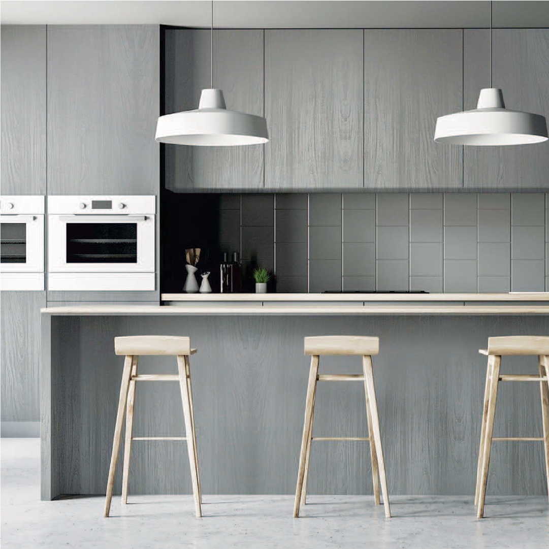 Slate grey acrylic wall panels in a contemporary kitchen with wooden stools, sleek cabinetry, and modern lighting fixtures.