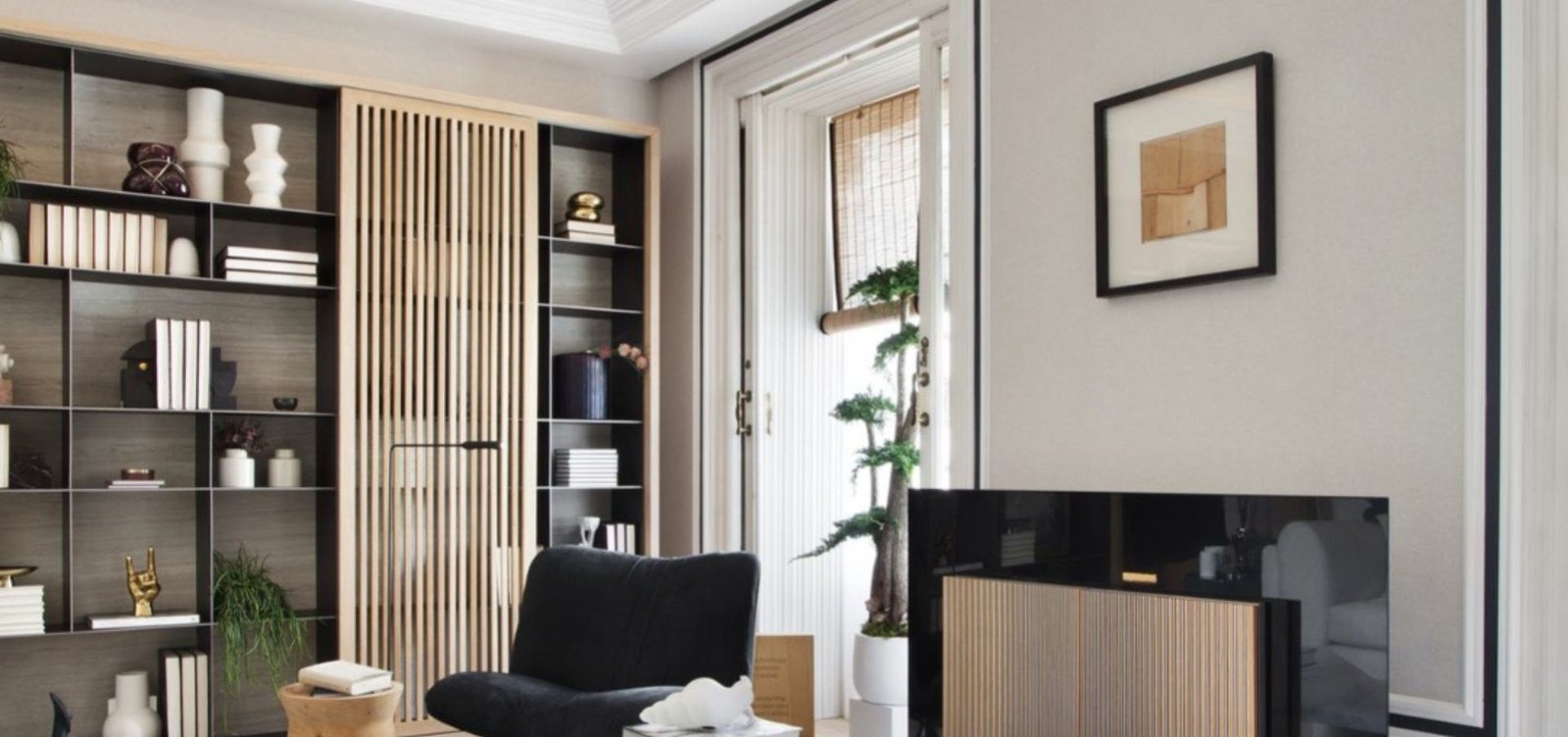 Cream color living room ceiling featuring modern WPC wall moulding, creating a sophisticated and stylish ambiance.