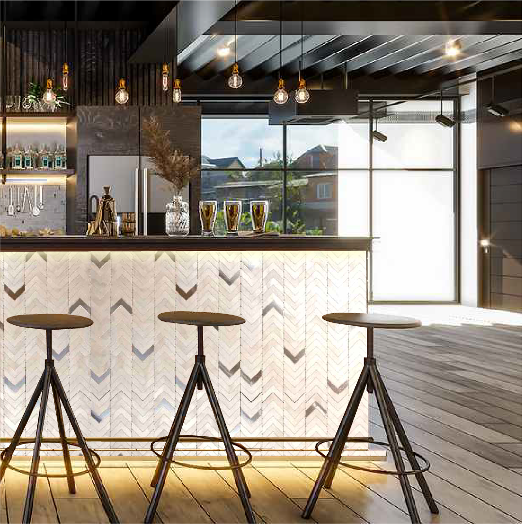 Dark grey mosaic wall panels with a chevron pattern, enhancing a modern bar area.